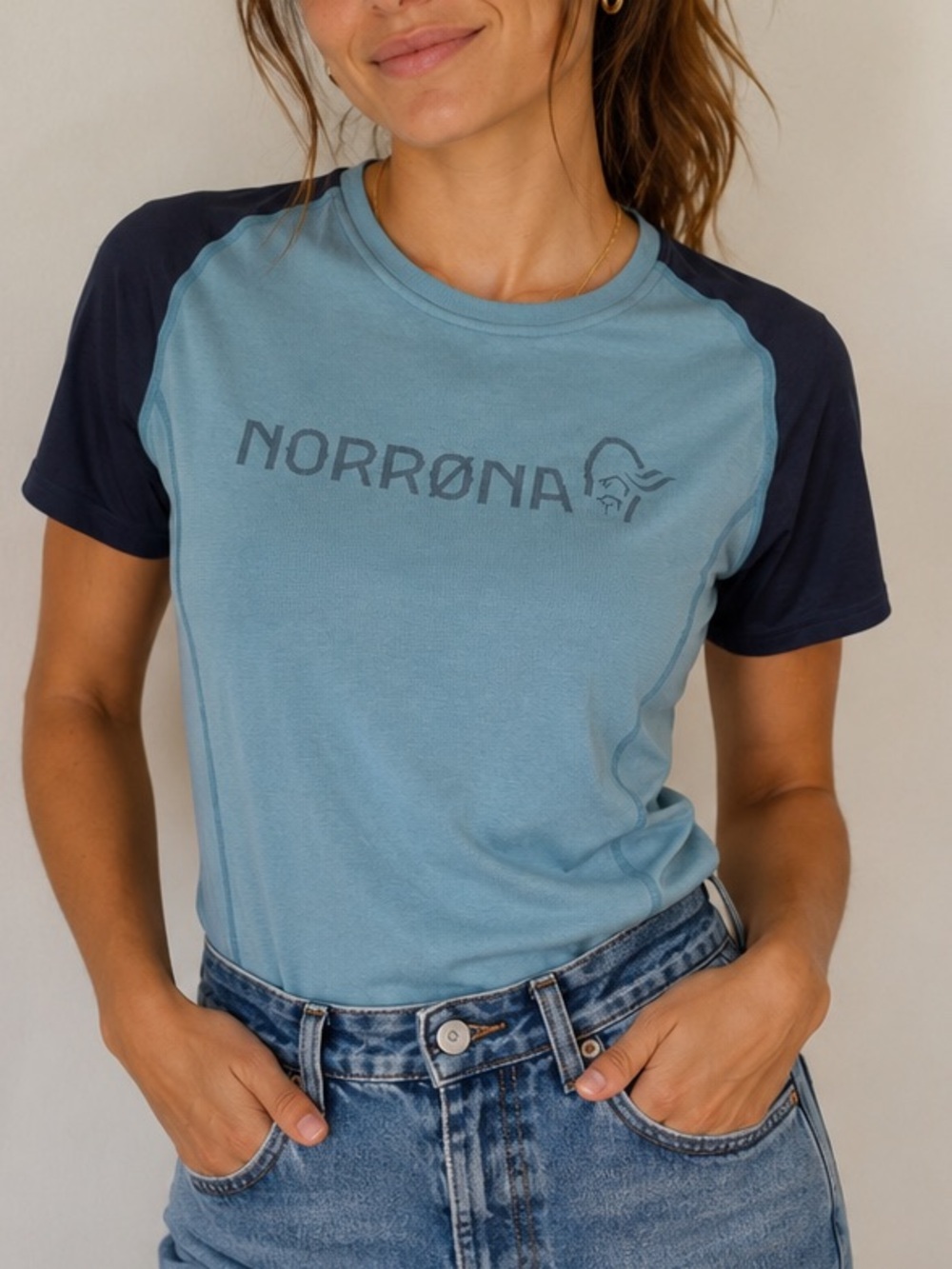 Norrona XS Women's Blue Short-Sleeve Performance Tee no fabric tag tiny pin hole